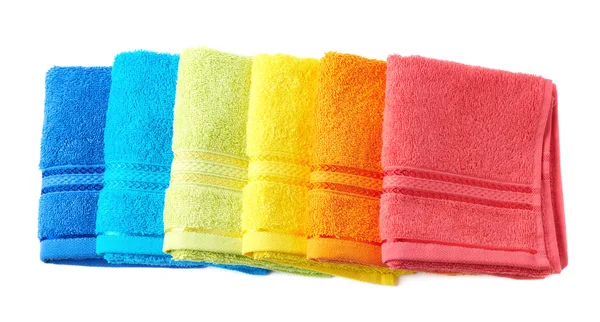 Högen av rainbow färgad handdukar isolerade — Stockfoto