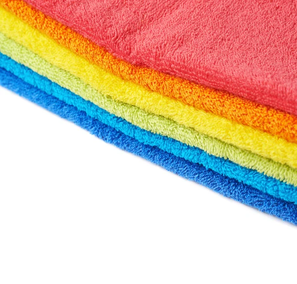 Rainbow colored pile of towels isolated — Stock Photo, Image