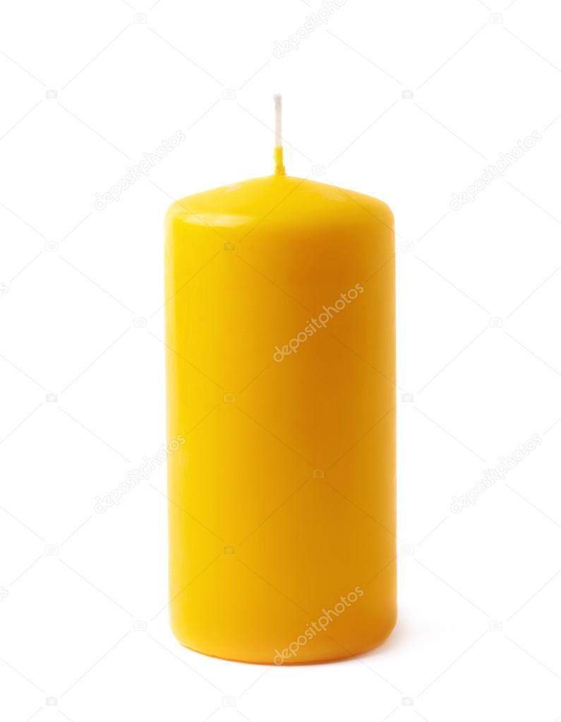 Single yellow wax candle isolated