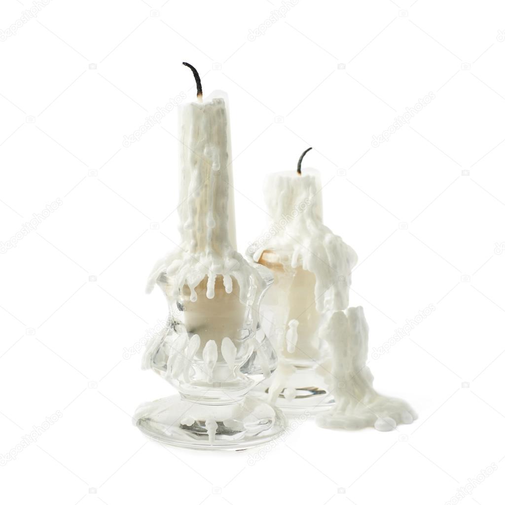 Burnt candle in candlestick isolated