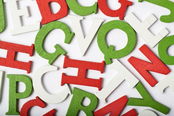 Oberfläche mit bunten Buchstaben bedeckt — Stockfoto