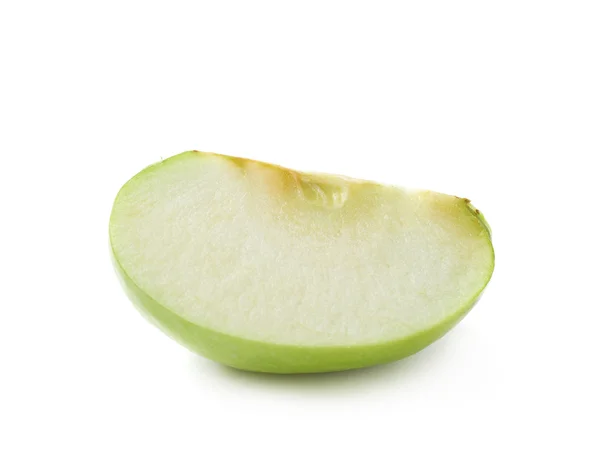 Zielone jabłko kromka na białym tle — Zdjęcie stockowe