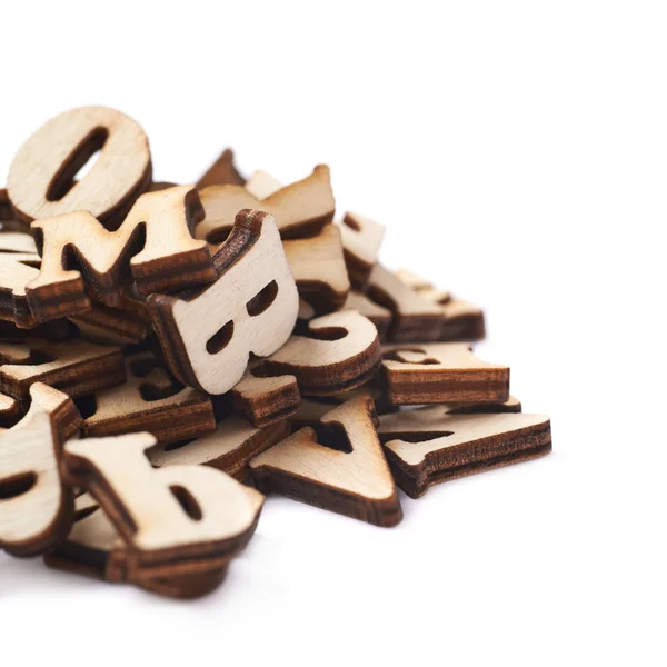 Hromada dřevěných písmen, samostatný — Stock fotografie