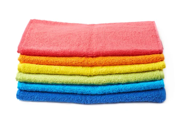 Pila de color arco iris de toallas aisladas —  Fotos de Stock