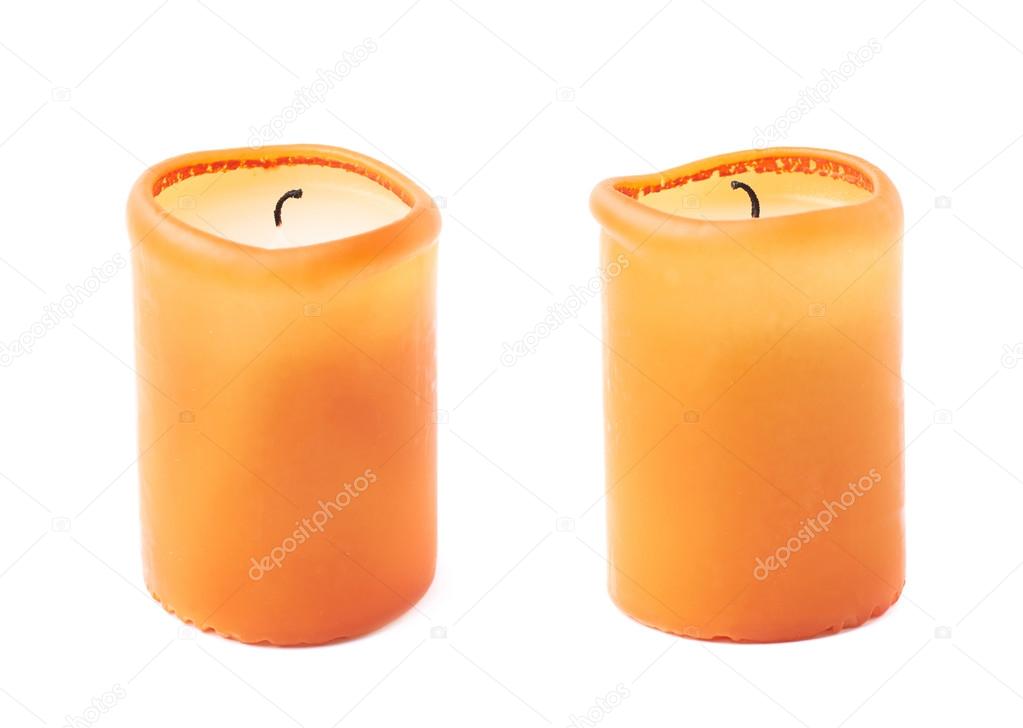 Burned orange candle isolated