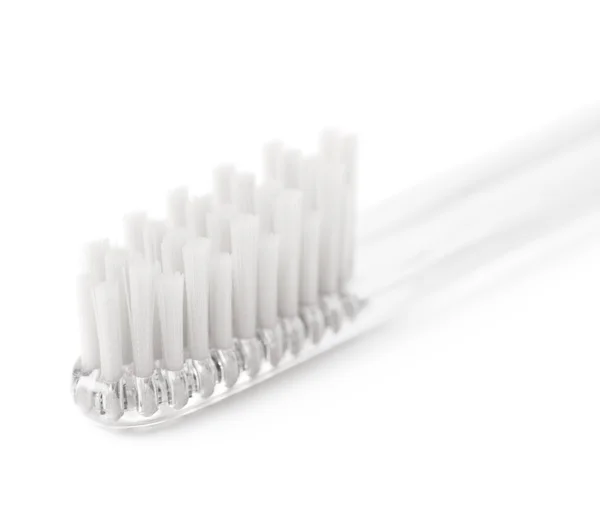 Brand new plastic toothbrush isolated — Stock Photo, Image