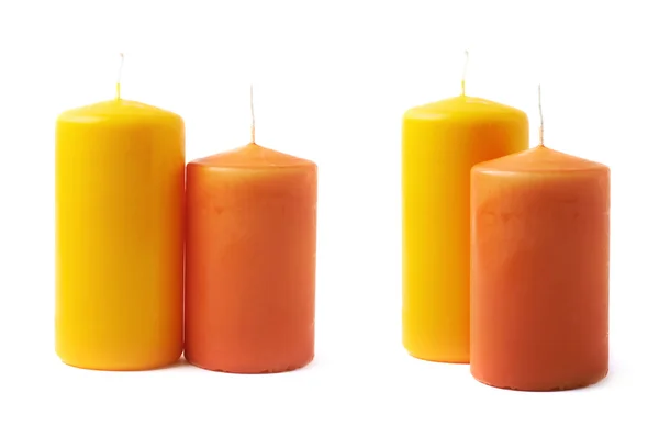 Velas amarillas y naranjas aisladas —  Fotos de Stock