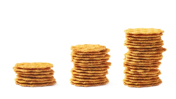 Three growing stacks of cookies — Stock Photo, Image