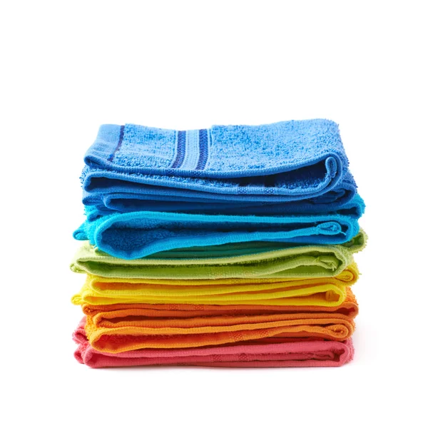 Högen av rainbow färgad handdukar isolerade — Stockfoto