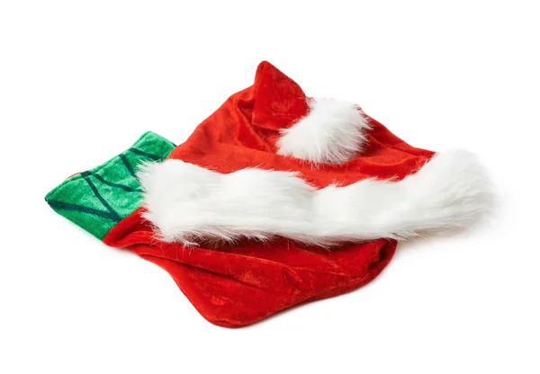 Santas hatt och Julstrumpa isolerade — Stockfoto