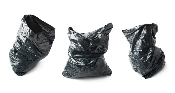 Filled black plastic garbage bag isolated — Stock Photo, Image