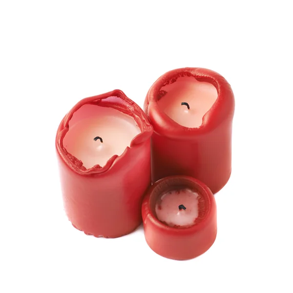Tres velas rojas aisladas —  Fotos de Stock