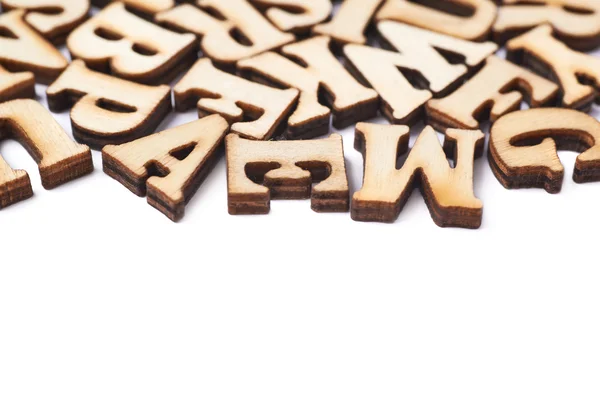 Surface covered with wooden letters — Stock Photo, Image