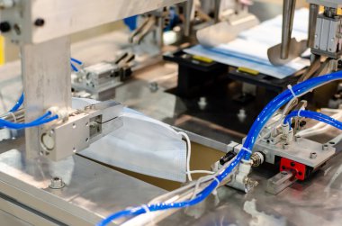 Tıbbi yüz maskesi yapma makinesi. Maske Üretim Hattı