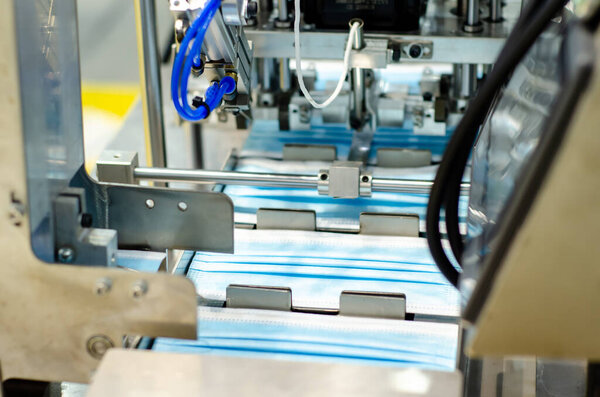 Машина для изготовления маски для медицинских лиц. Линия производства маски