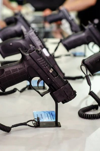 Handgun store shelves. A handgun for sale in the store.