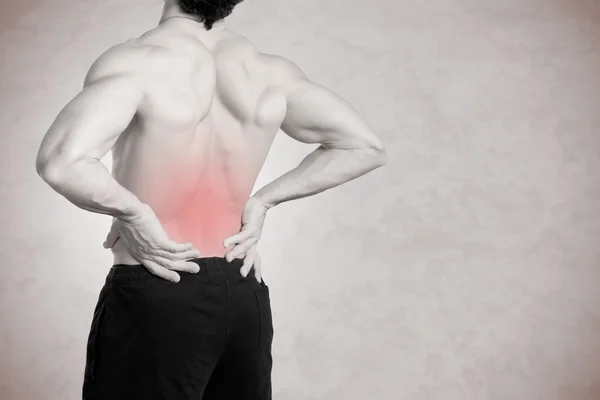 Primo piano del dolore alla schiena — Foto Stock