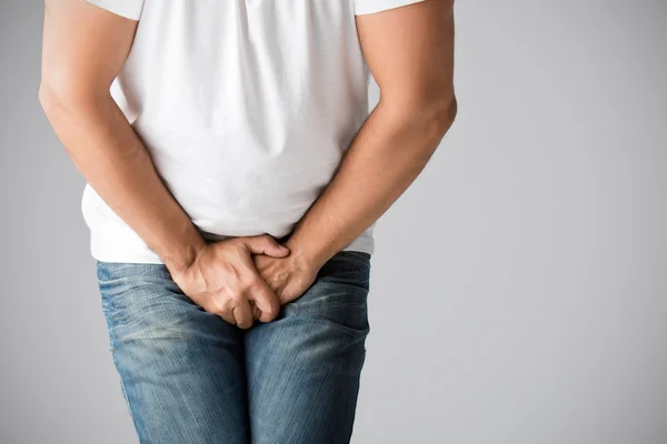 Man in Need to Urinate — Stock Image Man in Need to Urinate Stock Image