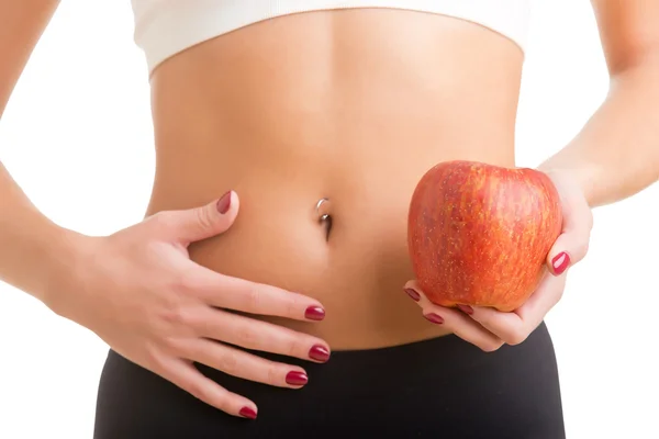 Mujer sosteniendo manzana — Foto de Stock