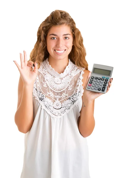 Mulher segurando uma calculadora — Fotografia de Stock