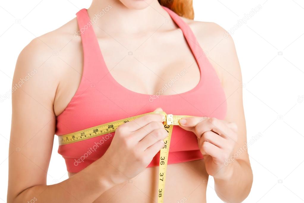 Woman Measuring Up Her Chest