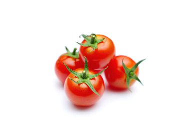 Fresh tasty red cherry tomatoes on white background