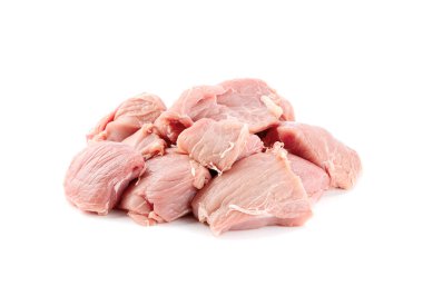 Raw turkey meat isolated on white background with spices. Fresh uncooked turkey breast meat for nuggets or escalope.