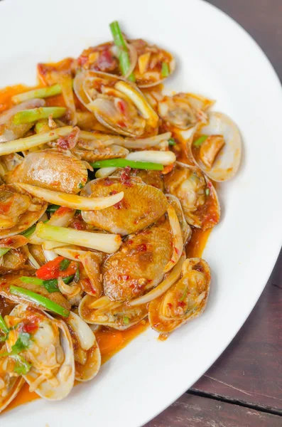 Spicy clams on dish — Stock Photo, Image