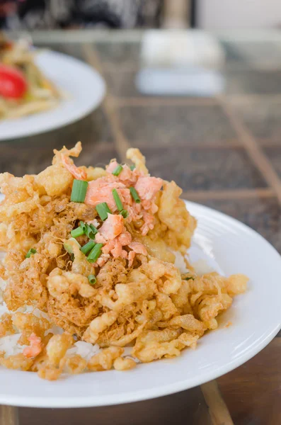 Fried crispy beaten egg omelette — Stock Photo, Image