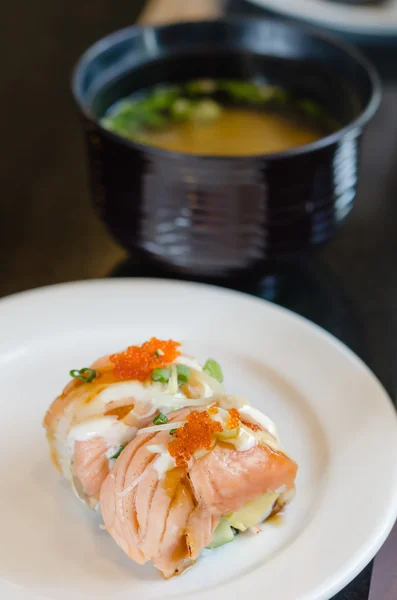 Salmon roll sushi and soup — Stock Photo, Image