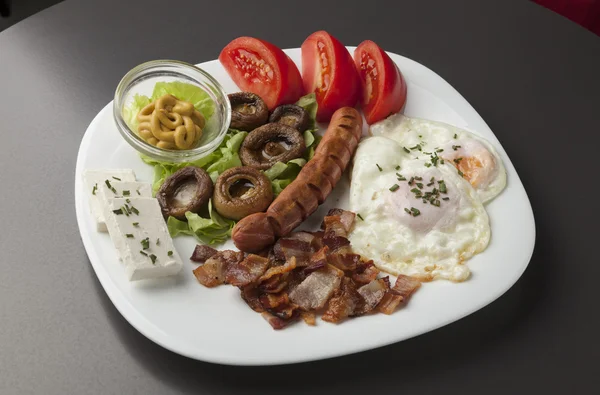 Breakfast served on a white plate — Stock Photo, Image