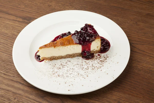 Cheese cake on white plate — Stock Photo, Image