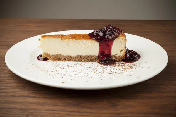 Cheese cake on white plate — Stock Photo, Image