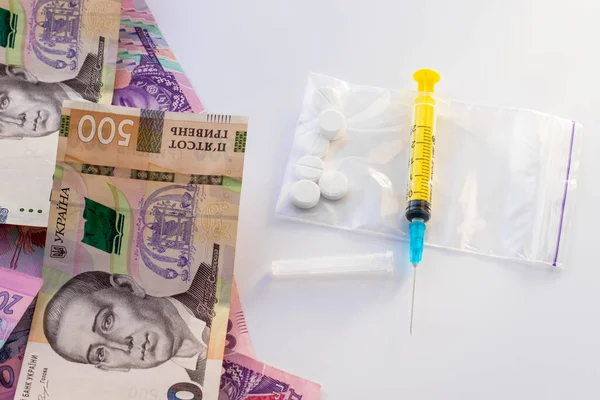 Syringe Pills Zip Lock Plastic Bag Lot Ukrainian Money Sale — Stock Photo, Image