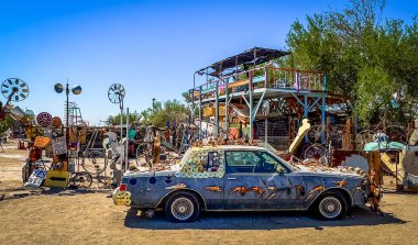 California, USA, Sept 30th 2024, view of a decorated car at East Jesus, an art installation at Slab City, an unincorporated alternative lifestyle community in the desert.