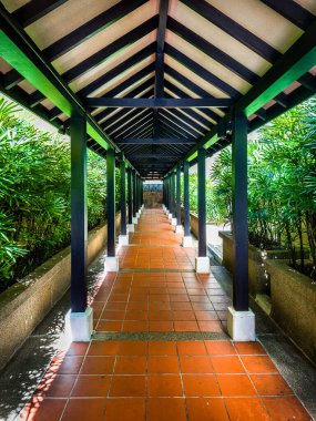 A view of an entrance walkway at Ann Siang Hill Park in Singapore's Chinatown district. 
