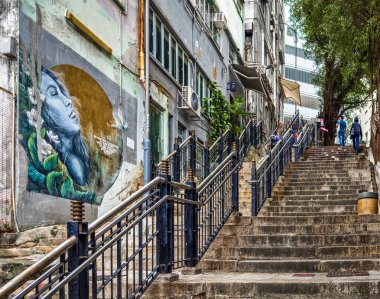 Hong Kong, Hong Kong Adası, 30 Ocak 2024, Merdiven Sokağı manzarası, batı bölgesinin bir parçası olan Sheung Wan bölgesinde tarihi, dik bir taş merdiven.