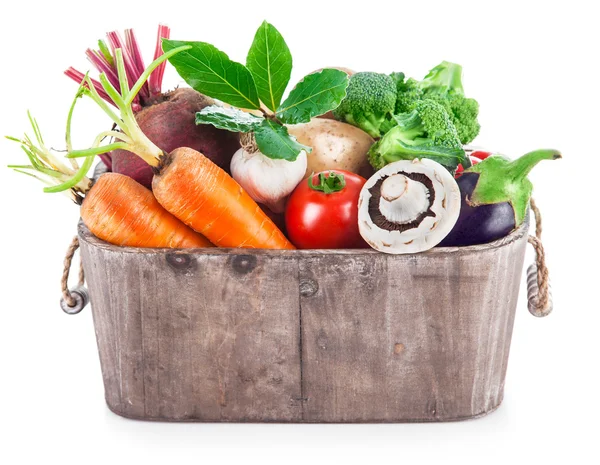 Harvest vegetables in wooden basket — Stock Photo, Image