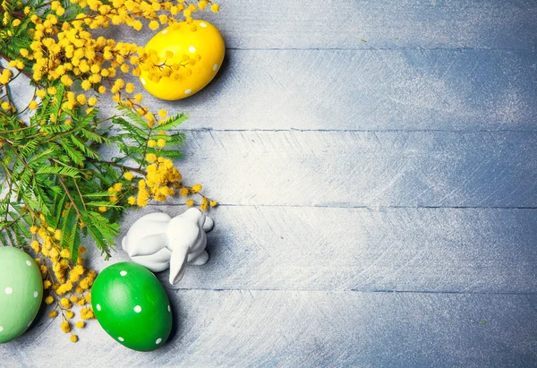 Easter still life with branch mimosa eggs — Stock Photo, Image