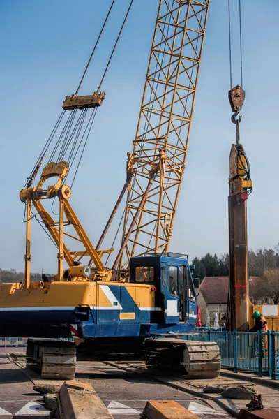 Work with crane and dam — Stock Photo, Image