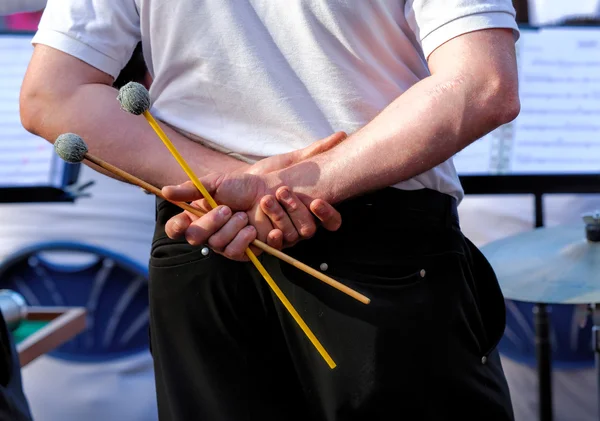 Drumsticks in male hands — Stock Photo, Image