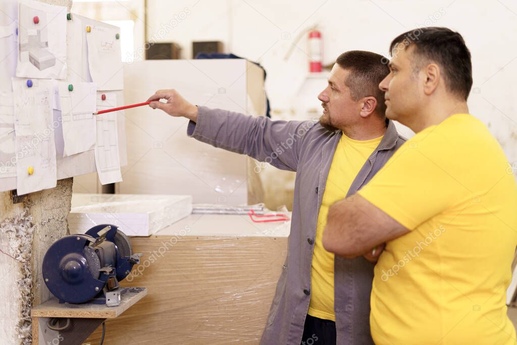 Carpenters working on furniture projects