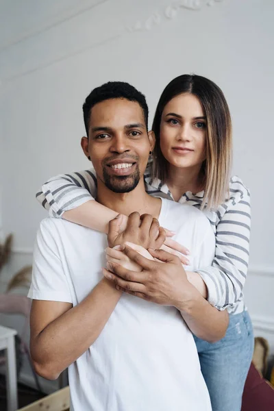 Beautiful mixed race couple portrait at home — Stock Photo, Image