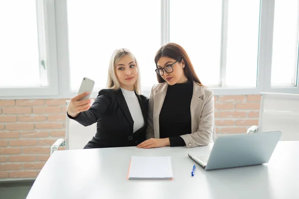 Two Beautiful Young Women Office Photographed Phone — Stock Photo, Image