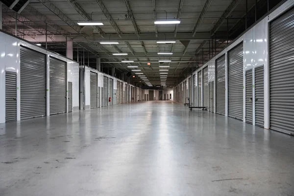 Wide Corridor Storage Facility Gray Doors Moving Storage Concept — Stock Photo, Image