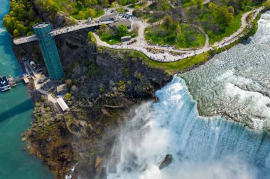 Aerial high angle view of American Falls and observation tower in Niagara Falls, United States clipart