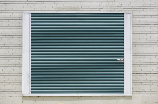 Unidade de armazenamento verde fundo da porta — Fotografia de Stock