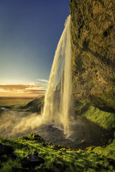 Solnedgång över Seljalandsfoss vattenfall på Island — Stockfoto