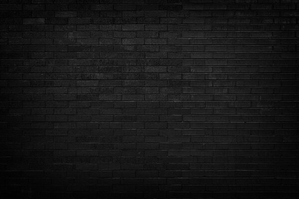 Черная кирпичная стена для фона 