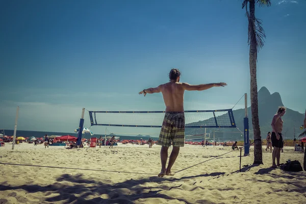 Slacklining at Ipanema Beach in Rio de Janeiro — стоковое фото